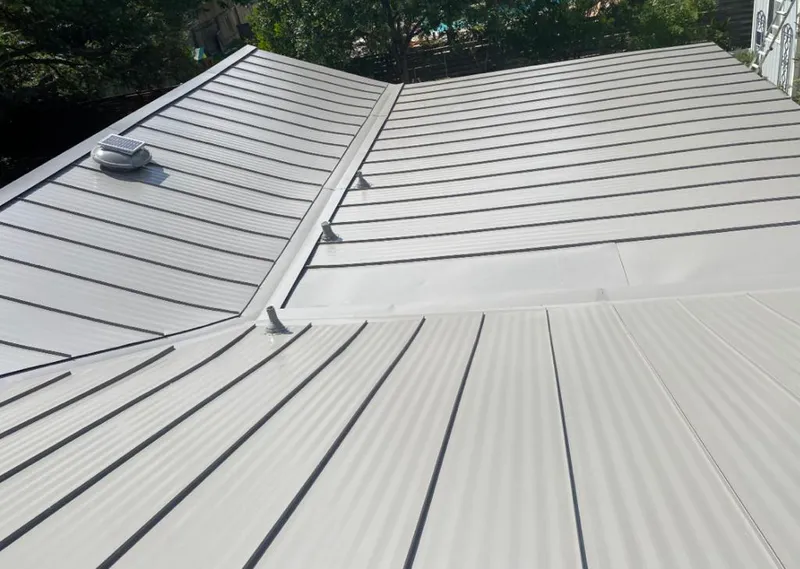 Solar attic fan installed on a metal roof for Roof Ventilation in Lucas Valley-Marinwood